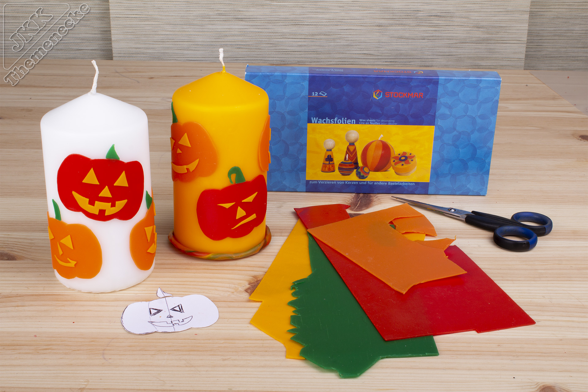 Halloween-Kerzen mit Kürbismotiven Materialbild