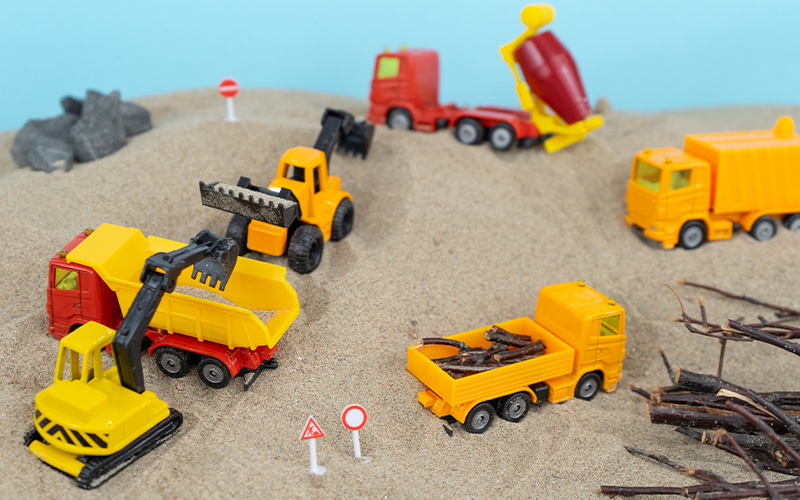 Spielzeugautos, Bagger und Lastwagen